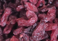 dried reddish fruit berries of Asiatic Cornelian Cherry Fruit are piled together