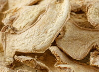 dried herb slices and pieces of ginger