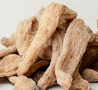 dried yellowish herbs of Gastrodia Tuber are piled together