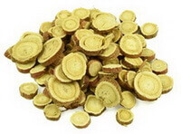 dried yellowish licorice root slices made from the root of Glycyrrhiza inflata Batal