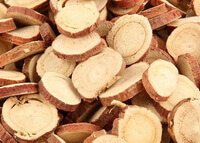 light yellowish dried licorice root slices of Radix Glycyrrhizae