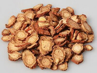 dried reddish herb slices of Radix Salviae Miltiorrhizae are piled together