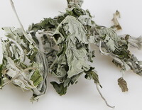 dried pale green herb pieces of Argyi Leaf