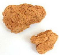 two khaki blocks of Calcined Yellow Earth,and big block and a small block