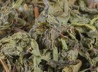 grayish green dried herb segments of Field Thistle
