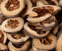 dried brownish herb slices of Immature Orange Fruit