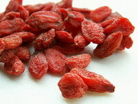 dried reddish berries of Lycium barbarum are piled together